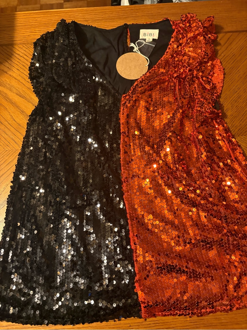 BiBi Orange and black sequin top size medium